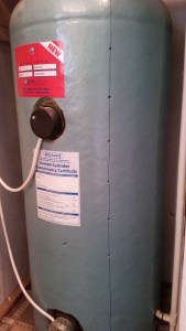 Hot water tank with holes for temperature sensors marked